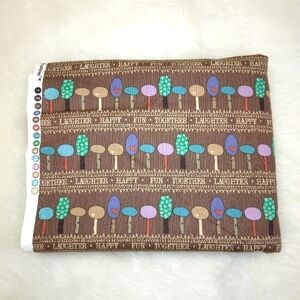 FABRIC Fun and charming stylized trees on Brown, an updated MCM feel